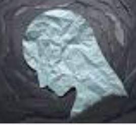 "An artistic illustration of a person in profile, looking downward in contemplation."